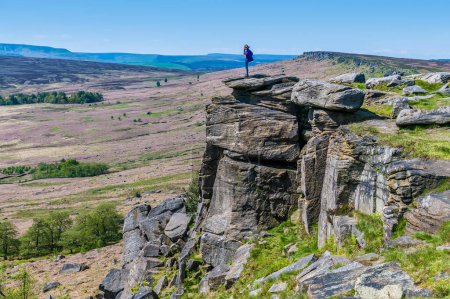 A classic view from the top of the Stanage Edge escarpment in the Peak District, UK in summertime