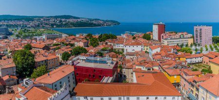 Photo for A panorama view west from the clock tower above Tito Square over the rooftops of Koper, Slovenia in summertime - Royalty Free Image