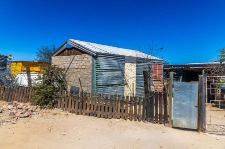 Photo for A view from the road towards an informal settlement in Windhoek, Namibia in the dry season - Royalty Free Image