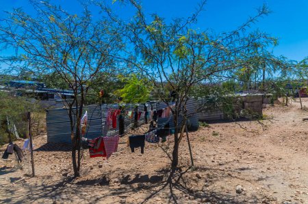 Photo for A view past washing towards an informal settlement in Windhoek, Namibia in the dry season - Royalty Free Image