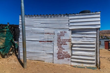Photo for A view towards a shop in an informal settlement in Windhoek, Namibia in the dry season - Royalty Free Image