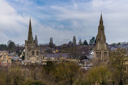 A view of twin church spires in the town of Stamford, Lincolnshire, UK in winter