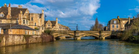 A view along the River Welland towards Stamford Bridge in Stamford, Lincolnshire, UK in springtime