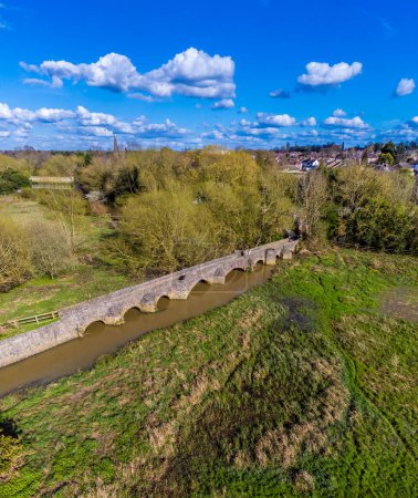 An aerial view along the packhorse bridge beside the Grand Union Canal in Aylestone Meadows, Leicester, UK in Springtime