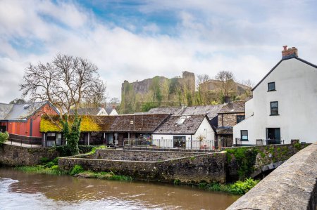 Photo for A view from the old bridge towards the castle ruins in Haverfordwest, Pembrokeshire, Wales on a spring day - Royalty Free Image