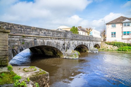 Photo for A view along the side of the road bridge over River Cleddau in Haverfordwest, Pembrokeshire, Wales on a spring day - Royalty Free Image