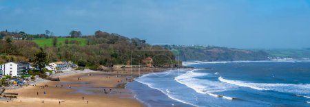 Photo for A panorama view over the beach at low tide in Saundersfoot, Wales on a bright spring day - Royalty Free Image