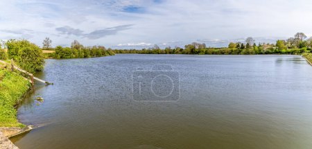 A panorama view across Welford Reservoir, UK on a bright spring day