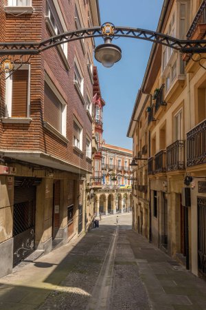 Photo for PORTUGALETE, SPAIN-MAI 10, 2022: Small street in the old town of Portugalete, Basque Country, Spain - Royalty Free Image