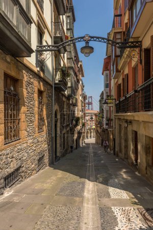 Photo for PORTUGALETE, SPAIN-MAI 10, 2022: Small street in the old town of Portugalete, Basque Country, Spain - Royalty Free Image