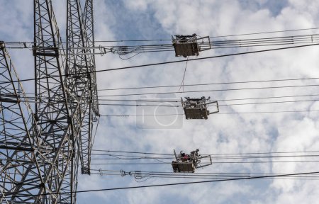 Photo for A newly installed high-voltage pylon with some cables connected - Royalty Free Image
