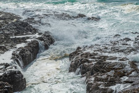 Photo for Large waves crush the coastline near Porto Covo, Portugal - Royalty Free Image