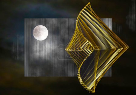 A  gold kinetic wind spinner with moon modern abstract