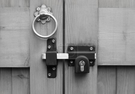 Latch handle and locking bolt for double gates