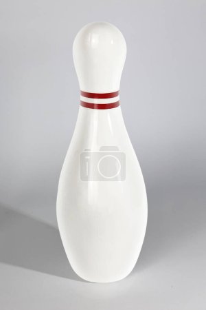 Close-up of a ten pin bowling pin isolated on a grey background