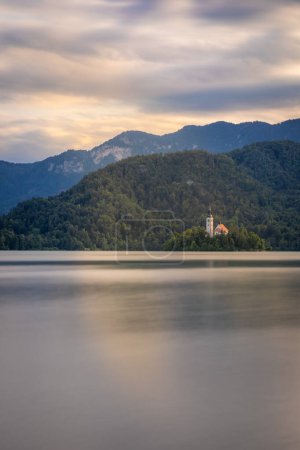 Photo for Evening view of Pilgrimage Church of the Assumption of Maria. Fantastic summer scene of Lake Bled, Julian Alps, Slovenia, Europe. Traveling concept background. - Royalty Free Image