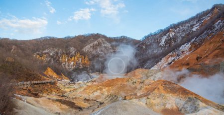 Photo for "Jigokudani Noboribetsu" located in a hot spring in Hokkaido prefecture. This place is a beautiful valley. There is hot water in the stream containing sulfur minerals. - Royalty Free Image