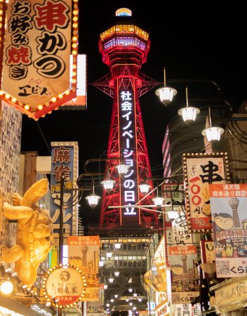 Photo for OSAKA, JAPAN - December 16, 2019:Tsutenkaku Tower is a symbol. And the viewpoint of Osaka city. The tower can be seen 360 degree vision.The area around the tower has a restaurant. and many shops. - Royalty Free Image