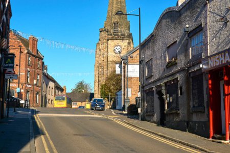 Photo for Sloping road leading to a church in Uttoxeter, Staffordshire, UK - Royalty Free Image