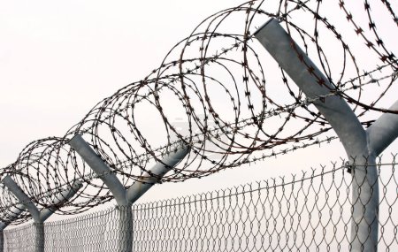 Barbed wire security fence example