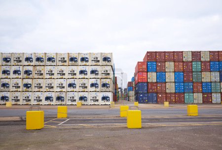 Photo for Shipping containers stacked up on a dock at Felixstowe, Suffolk, UK - Royalty Free Image