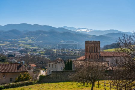 Photo for Cathedral of Saint Lizier and panorama of the Pyrenees, in Saint Lizier, in Ariege, in Occitanie, France - Royalty Free Image