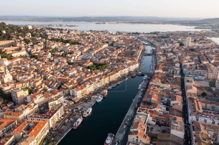 Photo for Aerial panoramic of the city of Sete at sunrise, in Occitanie, France - Royalty Free Image