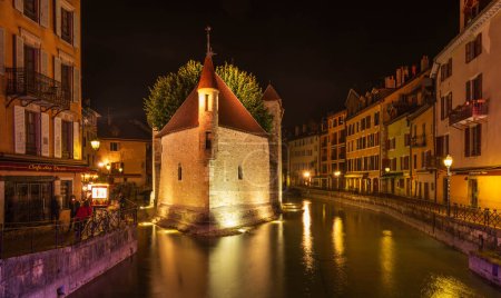 Photo for Palais de l'isle, on the Thiou river, in the evening, in Annecy, Haute-Savoie, France - Royalty Free Image