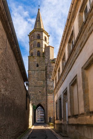 Photo for Bell tower and door of the Saint Michel church, in Castelnaudary, in Aude, in Occitanie, France - Royalty Free Image