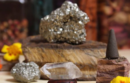 Foto de Incense Cone on Stone With Crystals and Flowers - Imagen libre de derechos