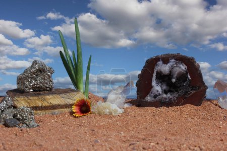 Photo for Chakra Stones and Aloe Plant on Australian Red Sand. Meditation Altar - Royalty Free Image