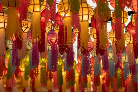 Photo for Blur background Lantern Festival in Lamphun Province of Thailand is decorated with Lanna style paper lanterns during Loy Krathong Festival, worship of Lord Buddha in Buddhism using paper lanterns. - Royalty Free Image