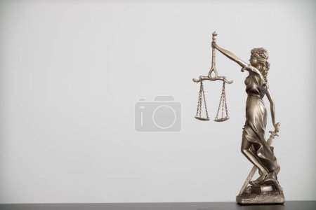 Photo for Statue of god Themis Lady Justice is used as symbol of justice within law firm to demonstrate truthfulness of  facts and power to judge without prejudice. Themis Lady Justice is of justice. - Royalty Free Image