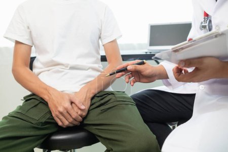 man was examined by doctor for prostate cancer and doctor diagnosed condition in order to treat patient with prostate cancer.  concept of receiving prostate cancer examination with specialist doctor