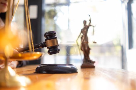 A judge gavel is prepared in the courtroom to be used to give a signal when the verdict is read after the trial is completed. Concept judge gavel is prepared to symbolize the decision in a court case.
