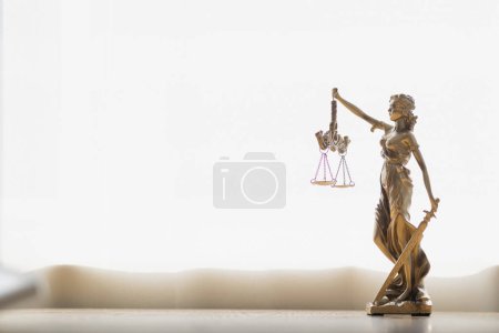 Photo for Statue of god Themis Lady Justice is used as symbol of justice within law firm demonstrate truthfulness of facts and power to judge without prejudice. hemis Lady Justice symbol of honesty and justice. - Royalty Free Image