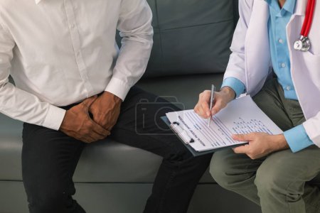 young man meets with doctor for checkup His sexual performance was impaired and doctors examined his symptoms and discovered that he had suspected tumor growing inside his penis Prostate cancer