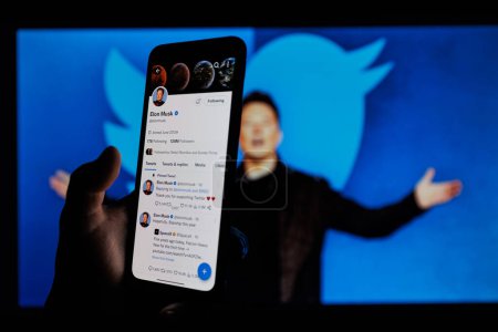 Photo for Vilnius, Lithuania - 2023 February 6: Elon Musk twitter account on mobile phone screen. Twitter logo in background - Royalty Free Image