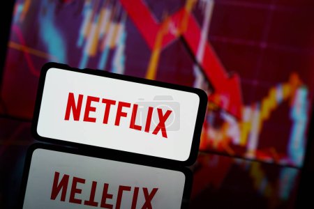 Photo for Paris, France - 2023 March 13: Netflix company shares go down at stock market. Netflix company financial crisis and failure. Economy collapse - Royalty Free Image
