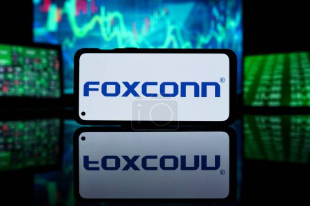 Téléchargez les photos : New York, États-Unis d'Amérique - 2023 29 mars : Foxconn company on stock market. Foxconn succès financier et profit - en image libre de droit