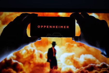 Photo for Vilnius, Lithuania - 2023 July 22: Oppenheimer movie logo and poster on screen. High quality photo - Royalty Free Image