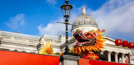 Photo for Dragon dance during Chinese lunar year celebrations in London, England - Royalty Free Image