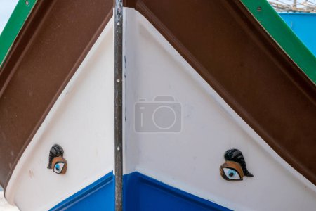 Photo for Marsaxlokk, Malta, May 2, 2023. One of the main attractions of Marsaxlokk are the famous colorful rowboats with eyes - Royalty Free Image
