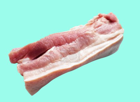 Photo for Pork belly, raw meat isolated with clipping path, no shadow in green background, cooking ingredients - Royalty Free Image