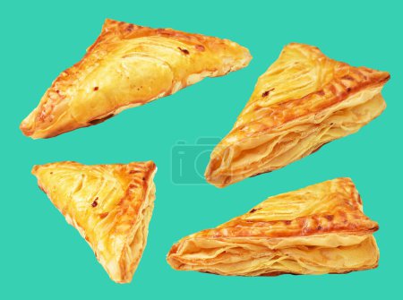 Photo for Puff pastry triangle isolated cheese  flaky pastry filled with pork meat with clipping path, no shadow in green background - Royalty Free Image