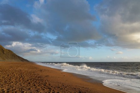 Photo for Clouds over the beach, Hive Beach, Dorset - Royalty Free Image