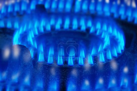 Photo for Blue fire gas stove with selective focus - Royalty Free Image