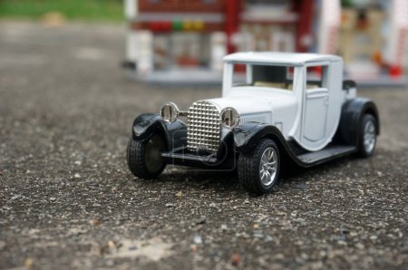 Photo for East Kutai, Indonesia - 30 December 2020: white classic car toys with selective focus. - Royalty Free Image