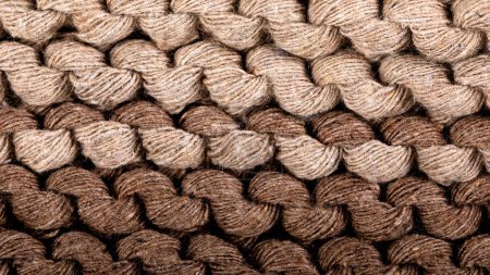 Photo for Detail of the handmade knitted pattern (two different shades of brown). Backgrounds. Texture. - Royalty Free Image