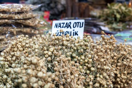 Photo for Dried Peganum harmala (uzerlik). Close-up of Peganum harmala in a local street market. - Royalty Free Image